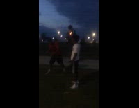 White shirt guy holds sparkler firework 