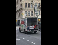 Lady Waves as Cargo Truck Goes Away