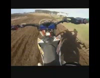 Dirt bike POV riding runs into person in orange clothes
