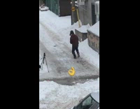 Guy trapper hat tiptoe on snow ok