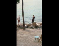 Collab IITW - Woman black coverups poses by the beach