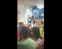 Passport pastry display case black sports bra