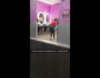 Three women tiktok dance inside the women's bathroom