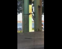 White shorts girl river city skyline car 