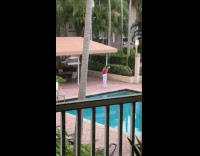 Collab IITW - Woman red top selfie by the pool