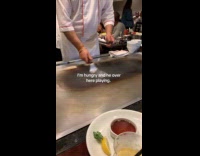Hibachi chef doing tricks while cooking