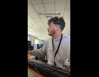 Man Takes off Headphone After Answers Call
