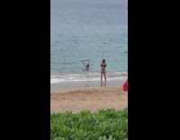 Woman bikini bend over hand stand beach Part 2