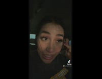 Friends use hands for broken windshield wiper 