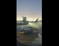 Airplane wing defrosted on the runway at sunrise