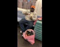 Guy eats ice cream pint on subway 