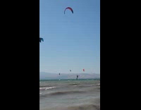 Collab SendItOfficiall - Man does few flips while parasurfing 