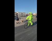 man green hazmat suit on bike