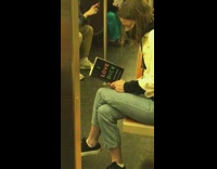 Lady Reads I Love Dick Book on Subway 