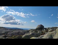 Time lapse mountain rocks and partial sunset