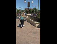 three kids dance Disney green shirt