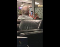 Grandpa watches videos of girls at airport