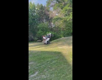 Vehicle tips over and lands on guys 