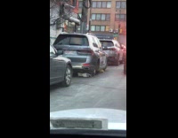 Car wheels stolen side of the road