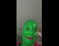 Lady in Green Face Paint Cries to Mum