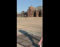 Blue shirt guy mocks copies poses girl 