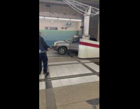 Car stuck in subway train platform told not to move