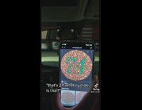 Guy arguing with friends trying to take color blind test in car 