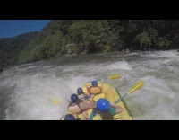 Collab JerrySlams - Rafters paddle down bumpy river on raft, get stuck and crash into other yellow rafts