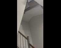 Delivery bag gets lifted up between stairs