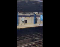 Woman carried by the man on his shoulders subway