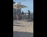 Girl black shirt pattern sunshade umbrella pebbles