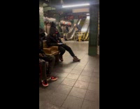 Random guy slides down jump from escalator