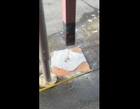 Sponge on ground catch water from pipe