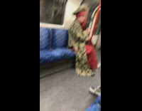 man dressed in gold and red robe and hat