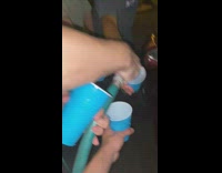 Spraying water from hose into blue cups squidward