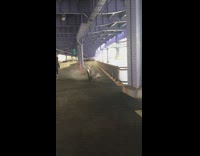 Burning trash outside by lake water