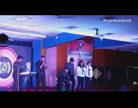 Band sings and plays Believer by Imagine dragons on stage at concert in front of crowd