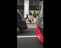 woman grey blazer walk traffic