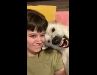 Woman posing with dog using hey audio