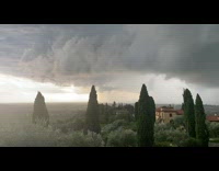 Time lapse white clouds move across sky 