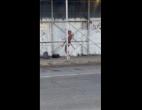 Guy wears devil costume dance on street