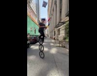 Collab WINY - Guy ride unicycle and juggle pins street