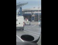 Guy drive boat with wheels into a ship