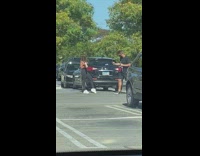 Girl parking lot shaker bottle black SUV