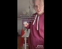 Woman feeds her cat the right amount 