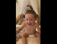 Baby Laughs as Lady Combs his Hair