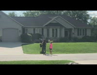 Black shirt girl tiktok dances with kid 