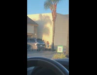 Girl poses wall shadow gets in way