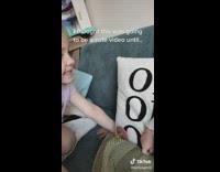 Kid Talks with Baby Sibling on Couch