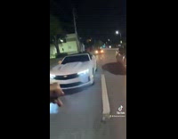 Guy gets out of car tire fire